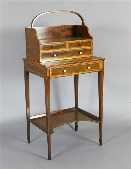 A George III mahogany inlaid and crossbanded cheveret , W.1ft 10in. D.1ft 4.5in. H.3ft 9in.